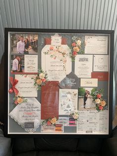 a collage of wedding cards and other items is displayed in a frame on a couch