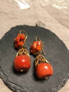 "Gorgeous Large undyed dark Salmon Coral gold(test 10k or better), drop earrings.  Condition I see no problems look at photos for details.  Size length 2\", largest bead is 17 1/2mm, wt of pair is 20.8 grams.  The filigree is hand wrought, perfect size filigree cap to drop beads, I believe they are Italianian, late Victorian to early 1900s.  Spectacular , classic when worn, they have the look of Ancient Rome jewelry.  Unusual large size." Handmade Briolette Earrings For Formal Occasions, Handmade Drop Jewelry For Formal Occasions, Formal Long Drop Pierced Jewelry, Artisan Long Drop Pierced Jewelry, Ornate Drop Earrings For Gifts, Bronze Pierced Earrings For Formal Occasions, Ornate Drop Earrings Gift, Elegant Chandelier Earrings With Round Beads, Intricate Design Dangle Earrings For Evening