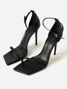 DESCRIPTION:With a square toe, single strap, and adjustable ankle strap, this stiletto heel is the perfect finishing touch for any evening ensemble.FEATURES:Open ToeSingle StrapAdjustable Ankle Strap100% LeatherHeel Height: 4.4 in. Fitted Heels With Single Toe Strap For Date Night, Sleek Ankle Strap Heels For Date Night, Sleek Fitted Sandals With Padded Heel, Fitted Heels With Single Toe Strap For Night Out, Classic Pointed Toe Sandals For Party, Classic Sandals With Sculpted Heel For Party, Classic Sandals With Wrapped Heel For Party, Classic Pointed Toe Party Sandals, Sleek Fitted Sandals With Block Heel