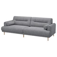 a gray couch sitting on top of a white floor