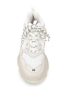 White leather Triple S bubble sneakers from Balenciaga featuring a front lace up detail, a cushioned air sole, branded detailing to the sides, a pull tab at the rear and three layered soles. | Balenciaga Triple S bubble sneakers Mesh Sneakers With Round Toe And Medium Fit, Medium Fit Mesh Sneakers With Round Toe, Designer Low-top Sneakers With Laces, Luxury Low-top Sneakers With Laces, Designer Lace-up Sneakers With Rubber Sole, Mesh Sneakers With Laces, Mesh Sneakers With Laces Medium Fit, Mesh Sneakers With Medium Fit, Medium Fit Lace-up Sneakers With Rubber Sole