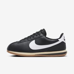 You spoke. We listened. Based on your feedback, we've revamped the original Cortez while maintaining the retro appeal you know and love. This version has a wider toe area and firmer side panels, so you can comfortably wear them day in and day out without any warping. Cortez fans—this one’s for you. Nike Retro Leather Sneakers, Retro Nike Leather Sneakers, Nike Retro Black Sneakers, Classic Black Sneakers With Gum Sole, Modern Black Sneakers With Rubber Toe Cap, Classic Black Sneakers With Rubber Toe Cap, Retro Black Sneakers With Gum Sole, Vintage Leather Sneakers With Rubber Heel Cap, Retro Black Sneakers With Round Toe