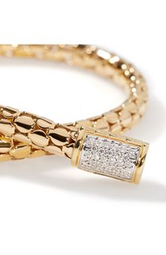 Polished 18-karat gold dots meet at a pavé diamond push-clasp on this handcrafted chain bracelet. Push-clasp closure Total diamond weight: 0.11ct. Color: G–H Clarity: S1 18k gold/diamond Imported >Diamond Guide Elegant Diamond Jewelry With Box Clasp, Yellow Gold Pave Setting Chain Bracelet, Yellow Gold Chain Bracelet With Pave Setting, Everyday Luxury Gold Diamond Bracelet With Pave Setting, Luxury Pave Setting Chain Bracelet, Luxury Pave Setting Round Chain Bracelet, Gold Bracelets With Pave Setting For Everyday Luxury, Everyday Luxury Gold Bracelet With Pave Setting, Luxury Yellow Gold Bracelet With Pave Setting