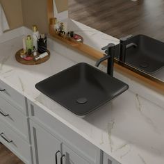 a bathroom sink sitting on top of a counter