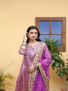 With festivals around the corner, wardrobe update is mandatory. Presenting brocades like never before. Made in straight silhouette with narrow pants and organza dupatta, which is beautified with lovely hand work. Taari and gotta detailing on dupatta is just the right touch. Color: Purple Fabric: Kurta & Bottom- Brocade Dupatta - Organza Note: Length and sizes can be customised Length - Kurta 40 inches Pants 38 inches Available in other colors If you happen to see some deformity in hand-work or f Festival Organza Sets, Brocade Anarkali Set With Resham Embroidery For Navratri, Semi-stitched Anarkali Sets In Brocade, Bollywood Style Brocade Sets With Zari Work, Semi-stitched Anarkali Brocade Set, Semi-stitched Brocade Sets With Zari Work, Brocade Saree Sets With Resham Embroidery, Festive Jamawar Sharara With Dupatta, Chanderi Churidar With Zari Work