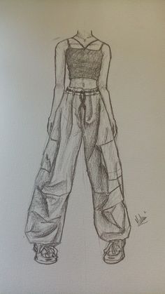 a drawing of a woman's pants and top on a white paper background,