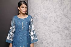 SKU: 403 Price for Shirt & Trouser 2pc Teal grey chiffon with all thread and floral embroidery with mirror work. Embellished with hand embroidery of pearl and crystals. White laces may vary. Traditional Blue Sets With Pearl Embroidery, Elegant Embroidered Chiffon Salwar Kameez, Wedding Salwar Kameez With Floral Embroidery In Chiffon, Elegant Designer Lace Dresses, Festive Blue Sets With Pearl Embroidery, Elegant Salwar Kameez With Intricate Embroidery For Spring, Elegant Lace Work Salwar Kameez For Eid, Elegant Formal Salwar Kameez With Lace Work, Elegant Long Sleeve Salwar Kameez With Lace Work