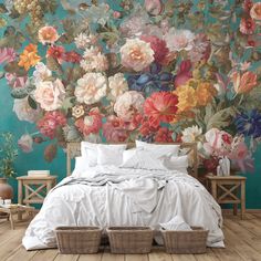 a large floral wall mural in a bedroom with white bedding and wooden flooring