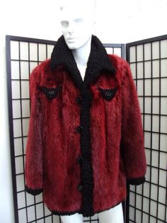 "BEAUTIFUL AND VERY STYLISH RED BEAVER FUR JACKET COAT FOR MEN. IT IS CREATED WITH SELECTED BEAVER FUR SKIN WORKED \"LET OUT\", THE BEST TECHNIQUE. IT IS ACCENTUATED WITH BLACK LAMB FUR TRIMMING. IT HAS A WING COLLAR, FRONT BUTTONS CLOSURE AND TWO SIDE POCKETS. THIS ITEM WAS MADE IN CANADA THIS COAT IS CUSTOM MADE: PLEASE PROVIDE US YOUR BODY MEASUREMENT SUCH AS HEIGHT, WEIGHT, CHEST CIRCUMFERENCE AND SLEEVE LENGTH. PLEASE NOTE, THAT IT WILL BE CLEANED BEFORE SHIPPING! MEASUREMENTS:   LENGTH: 34\" SLEEVE: CUSTOM MADE;  MEASURED FROM THE SIDE OF THE NECK; THEY CAN BE ADJUSTED ACCORDINGLY IF REQUESTED SIZE:  CUSTOM MADE- CREATED ACCORDING TO THE BODY MEASUREMENT WHY YOU SHOULD BUY YOUR PRE-OWNED FURS ONLY FROM OUR COMPANY? BECAUSE WE SIZE AND REPAIR OUR COATS BEFORE SHIPPING AND WE OFFER A R Luxury Red Single-breasted Outerwear, Burgundy Winter Formal Outerwear, Designer Fur Coat For Fall Formal Events, Luxury Red Winter Blazer, Luxury Burgundy Outerwear For Winter, Luxury Burgundy Winter Outerwear, Red Lapel Collar Outerwear For Winter, Elegant Red Fur Coat For Winter, Luxury Red Fall Outerwear