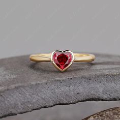 ABOUT THIS RING Heart Shape Lab Created Ruby Engagement Ring 18K Yellow Gold Unique Ring Red Gemstone Ring Solitaire Ring Anniversary Gifts -------------------------------------------------------- 「Product Summary」 ◆ Metal Material: 925 Sterling Silver / Gold / Platinum ◆ Center Stone Stone: 1.0ct Lab Created Ruby Cut: 6*6mm Heart Cut ◆ Dimension Band width: 1.8mm ◆ More Information *Can be custom item *Rush orders are accepted *2~3 weeks for order length *14 days money back return policy (excep Ring Heart Shape, Ruby Solitaire Ring, Red Gemstone Ring, Gold Color Ring, Ring Heart, Ruby Engagement Ring, Red Gemstones, Matching Rings, Unique Ring