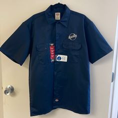 Navy Blue Moon Dickies Large Work Shirt Blue Short Sleeve Tops With Pockets, Blue Crew Neck Shirt With Button Closure, Blue T-shirt With Pockets And Short Sleeves, Navy Cotton T-shirt For Work, Blue T-shirt With Button Closure And Crew Neck, Blue Work Shirt With Pockets, Blue Collared Short Sleeve Shirt With Pockets, Blue Workwear Shirt With Pockets, Blue Short Sleeve Top With Button Closure