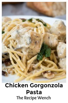 chicken gorgonzoola pasta on a white plate