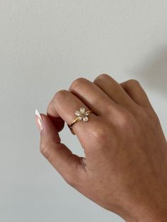 Flower ring - This adjustable dainty flower ring is incredibly stunning. Made to sparkle and shine on any finger! A perfect gift for women, girlfriend, best friends, sisters, moms. A perfect option for those who like minimal dainty gold rings and want to have the perfect size. - gold filled- stainless steel and gold- cz stones- Style: Minimalist Dainty 14k Gold Flower Ring For Wedding, Delicate Spring Flower Ring, Delicate Flower Ring For Spring Gift, Delicate Jewelry For Anniversary In Spring, Dainty Rose Gold Cubic Zirconia Midi Rings, Rose Gold Flower-shaped Rings With Cubic Zirconia, Delicate Jewelry For Spring Anniversary, Rose Gold Flower-shaped Cubic Zirconia Rings, Delicate Cubic Zirconia Crystal Ring