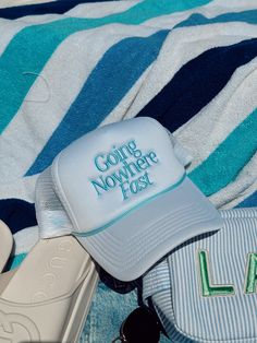 In collaboration with Aubrey! Going nowhere fast - white foam trucker with baby blue embroidery + rope! Whether you are on the boat, at the pool, or laying on the beach, this is the perfect hat for all summer wear! Ships immediately unless on preorder! Spring Vacation Trucker Hat, Blue Baseball Cap For Summer Vacation, Summer Style Trucker Hat For Outdoor, Summer Blue Snapback Trucker Hat, Trendy Summer Trucker Hat For Travel, Summer Vacation Blue Baseball Cap, Blue Summer Vacation Baseball Cap, Blue Snapback Trucker Hat For Summer, Trendy Trucker Hat For Summer Travel