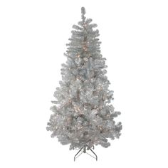 a white christmas tree with clear lights on the top and bottom branches, in a metal stand