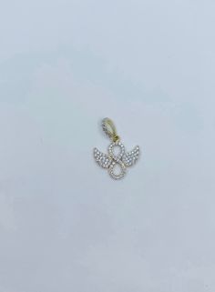 Style 1 10k gold pendant Angel ❤️ Women's charm 14mm ❤️ yellow gold with white cubic zirconia ---------------- ❤️ dije de oro de 10kilates ❤️ dije de mujer ángel 14 milímetros ❤️ oro dorado con zirconia Blanca SKU 372 Style 2 ❤️ 10k gold pendant Angel ❤️ Angel Approx 15mm long ❤️ women ------------- ❤️ Dije colgante de oro de 10kilates ❤️ Ángel de mujer de 15 milímetros ❤️ Oro dorado ❤️ Incluye cajita SKU 372 Style 3 ❤️ 10k Real gold pendant angel ❤️ Dainty Girl or women or boy ❤️ Yellow and whi Gold Charms With Diamond Accents As Gifts, Gold Charms With Diamond Accents For Gifts, White Cubic Zirconia Charm Jewelry, Gold Cubic Zirconia Pendant Charms, Small Angel, Angel Pendant, 10k Gold, Real Gold, Houston Tx