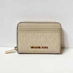 Michael Kors Jet Set Travel Medium Zip Around Card Case Wallet Pvc Leather Light Sand Retail: $188.00 Plus Tax Gold Toned Hardware 2 Credit Card Slots At Back Zip Around Closure Custom Fabric Lining 4card Slots, 2 Open Compartment 1 Slip Compartment In Middle 4.25"(W)X 3"(H)X 1"(D) Very Clean, Smoke-Free And Pet-Free Environment. Michael Kors Gold Wallet For Everyday Use, Michael Kors Beige Rectangular Wallet, Michael Kors Luxury Beige Wallet, Gold Michael Kors Wallet For Everyday Use, Luxury Beige Michael Kors Wallet, Michael Kors Keychain, Michael Kors Designer, Mk Wallet, Gold Wallet