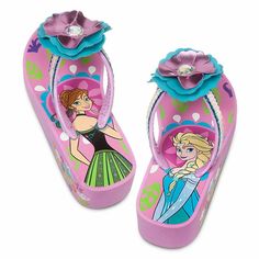 two children's flip flops with princesses on them