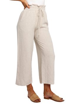 These cropped wide-leg pants are crafted from a lightweight linen blend and topped with a smocked waist and handy side pockets. Ties at waist Side pockets 65% linen, 35% cotton Hand wash, dry flat Imported Chic Linen Wide Leg Pants With Pull-on Style, Vacation Wide Leg Capris With Pockets, Spring Linen Wide Leg Pants With Pull-on Style, Summer Beige Cropped Wide Leg Pants, Spring Linen Wide Leg Pants With Elastic Waistband, Solid Color Linen Wide Leg Pants With Elastic Waistband, Casual Solid Color Linen Capris, Casual Wide Leg Linen Capris, Spring Wide Leg Pants In Flax With Relaxed Fit