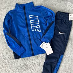 Nike Two-Piece Athletic Set For Little Boys, Size 3-4 Years. Royal Blue And Navy Blue In Color. New With Tags Attached. Fitted Blue School Sets, Blue Fitted School Sets, Nike Blue Playtime Sets, Blue Sports Sets For Winter, Nike Long Sleeve Blue Set, Blue Sportswear Sets For Winter, Winter Sports Sets In Blue, Blue Winter Sports Sets, Blue Winter Sports Set