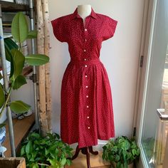 Rare To Find Vintage Laura Ashley (Est. 1980’s) Midi Length 50’s Style Dress. Features A Mini White Star Pattern On Red Background. Matching Sash Belt. Excellent Vintage Condition Note Small Faint Stain @Bottom Hem ~.25”X.5” (Otherwise Looks Brand New) Button Up Hand Side Pockets Collar Short Sleeve 100% Cotton Pearlescent Shell Buttons Original Extra Button Included Size 8 ~ Measurements Taken Flat, X2 Where Needed: 17” Pit To Pit 8” Sleeve Opening 15” Waist 45” Long Style Emulated By: Christy Red Vintage Short Sleeve Dress For Spring, Red Short Sleeve Vintage Dress For Spring, Red Retro Vintage Dress For Spring, Red 1950s Style Spring Dress, Red Knee-length Vintage Summer Dress, Red Fitted Vintage Summer Dress, Fitted Red Vintage Summer Dress, Fitted Red Vintage Dress For Summer, Vintage Red Short Sleeve Dress