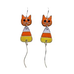 Candy Corn Cat Earrings: Playful Whiskers and Sweet Whimsy Get ready for a delightful treat with these Candy Corn Cat Earrings! Handmade with love, these earrings feature a playful cat design with a candy corn body and a long, elegant silver tail. These playful felines are here to add a dash of whimsy and sweetness to your style. 🍬 Paws and Candy Corns: These earrings are a playful fusion of two favorites - cats and candy corns! The quirky combination brings a playful and sweet twist to your ev Fun Orange Dangle Earrings, Playful Orange Dangle Jewelry, Whimsical Enamel Earrings Nickel Free, Whimsical Yellow Nickel-free Earrings, Orange Enamel Earrings Nickel Free, Nickel-free Orange Enamel Earrings, Cute Nickel-free Orange Earrings, Cute Orange Nickel-free Earrings, Fun Orange Drop Earrings