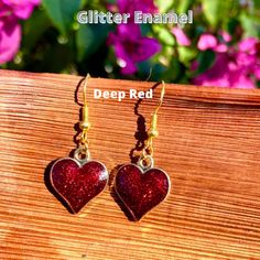 Show yourself or a friend some love with these adorable hypoallergenic sparkly glitter enamel heart earrings! These are great for formal or casual wear and are made of durable, brightly colored glittery enamel and metal alloy. Available in 3 colors: Deep red, hot pink and light pink Dangle length is approximately 1-inch. Heart charm is approximately 0.6-inch by 0.7-inch Hypoallergenic earring hooks Show Yourself, Valentines Earrings, Hypoallergenic Earrings, Earring Hooks, Red Hot, Heart Earrings, Deep Red, Heart Charm, Bright Colors