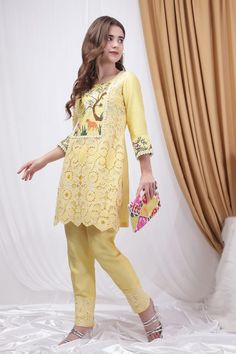 Lemon yellow straight kurta featuring lace detailing in the front with forest inspired motifs of deer, wild florals and leopard thread embroidery. Paired with a solid lace detailed pant. - Aza Fashions Embroidered Yellow Lawn Suit, Spring Yellow Embroidered Lawn Suit, Yellow Intricately Embroidered Summer Sets, Yellow Sets With Intricate Embroidery For Summer, Yellow Embroidered Summer Sets, Spring Embroidered Yellow Lawn Suit, Summer Yellow Sets With Intricate Embroidery, Lace Work Lawn Suit For Summer, Summer Lawn Suit With Lace Work