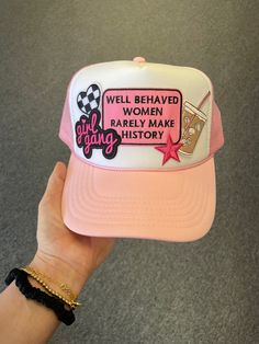 Pink and white mesh back trucker hat with patches applied.  Show your personality with this trendy trucker hat! Pink Trucker Hat With Patches, Trucker Hat Patch Ideas, Patch Trucker Hat Ideas, Cute Trucker Hats, Trucker Hats With Patches, Hat With Patches, Pink Trucker Hat, Hat Bar, Pink Patch