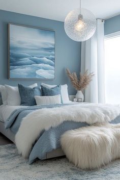 a bedroom with blue walls and white fur on the bed