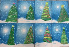 four christmas trees are painted in different colors and designs on blue paper with white snowflakes