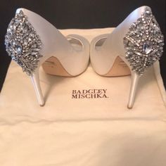 Badgley Mischka Rhinestone Satin Pumps 4.8” Heel Covered With Rhinestones Peep Toe Reveals Partially Hidden 1” Platform Leather Sole Ivory Satin Only Worn Once Size 7 White Lady, Prom Heels, Badgley Mischka Shoes, Satin Pumps, Wedding Heels, Platform Pumps, Badgley Mischka, Bridal Shoes, Wedding Shoes