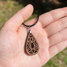 Details: - Wooden Pendant Necklace - Laser Engraved Wood Pendant  - 1.25 inches pendant length, adjustable chain All jewelry is handmade and unique to each order! Brown Teardrop Jewelry For Gift, Adjustable Pendant Drop Necklace Gift, Adjustable Pendant Drop Necklace As Gift, Adjustable Drop Pendant Necklace For Gift, Adjustable Pendant Drop Necklace For Gift, Handmade Spiritual Teardrop Drop Necklace, Handmade Spiritual Drop Necklace As Gift, Artisan Teardrop Necklaces As Gifts, Handmade Adjustable Teardrop Drop Necklace