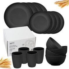 black dinnerware set with wheat stalks in the foreground and white box on the right