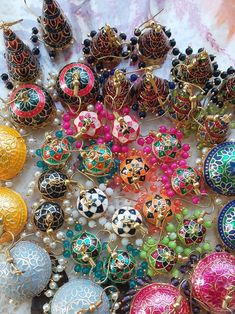 Meenakari Jhumkas!! Mixed lot !! Perfect for casual wear !! Cheap Meenakari Danglers For Festivals, Traditional Jhumkas For Eid Festivities, Traditional Jhumkas For Eid Festival, Traditional Jhumkas For Eid, Traditional Jhumkas For Eid Celebration, Temple Jewelry Jhumkas For Festive Eid Occasions, Temple Jewelry Jhumkas For Festive Eid, Traditional Chandbalis With Latkans For Celebrations, Temple Jewelry Style Jhumkas For Eid