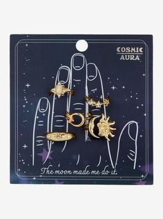 Channel the cosmos with this gold-tone stacking ring set! Featuring celestial sun  moon and star designs with sparkly gem detailing.Size 4  6 & 7Nickel-free alloy; acrylicSet of 5Imported Cosmic Aura, Sakura Art, Celestial Sun, Star Clothing, Lampoon's Christmas Vacation, Blue Beetle, Halloween Horror Nights, Stacking Ring Set, Sun And Stars