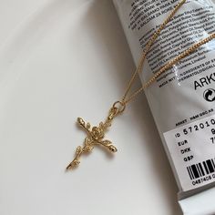 You are art.. We just accessorize it! Meet LUCE Dainty chain necklace with cathedral inspired cross pendant Layers wonderfully in a collection or beautiful as a stand alone piece! High quality fine art jewelry made from recycled materials when available 18k gold plated and 925 sterling silver Chain Length 16 Inch (40cm-5cm) shown with the CHARLIE huggies https://www.etsy.com/listing/1038548955/charlie-gold-huggies-hoop-earrings?click_key=5a2583545a852029b27eb1f71da6d0c9ee7847f4%3A1038548955&clic Dainty Chain Necklace, Jewelry Safe, Fine Art Jewelry, Hoop Earring Sets, 925 Sterling Silver Chain, Cross Jewelry, Leaf Necklace, Garden Toys, Gold Plated Chains