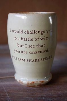 a coffee cup with shakespeare quote on it