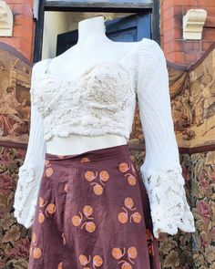 "Cute 1980s 90s white crochet lace cropped bustier top with sleeves Bust 32\" underbust26\" £28.99 ( plus p and p ) Condition  Minor flaws hook and eyes need sorting abit" Fitted Crop Top With Lace Sleeves, Fitted Cropped Lace Top Blouse, Fitted Cropped Blouse With Lace Top, Fitted Lace Top Cropped Blouse, Fitted Cropped Lace Blouse, Fitted Cropped Lace Top For Spring, Fitted Lace Cropped Blouse, Lace Trim Crop Top, Fitted Crochet Lace Crop Top