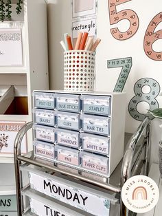 there are many different types of items on the shelf in this room, including pencils and markers