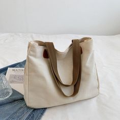 Bag Size: 35cm*27cm*9 cm (1-2cm erros)Material: CanvasUse:Tote Bag/Handbags/Shoulder Bag/Shopping Bag