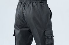 DETAILSMid waistThickness: MidweightMade of cotton and polyesterAnkle-Length PantsFit Type: RegularWaist with drawstring Combat Style Cotton Trousers, Combat Cotton Trousers, Cotton Combat Bottoms With Side Pockets, Combat Cotton Pants With Hip Pockets, Cotton Combat Pants With Hip Pockets, Black Techwear Work Pants With Pockets, Black Cotton Work Pants With Cargo Pockets, Black Techwear Work Pants With Multiple Pockets, Black Cotton Pants With Functional Pockets