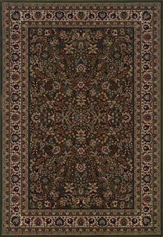 a black and beige rug with an ornate design on the bottom, in front of a white background