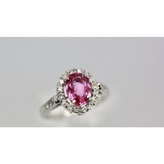 This is part of Chairish’s Fine Jewelry assortment.  Pink Sapphire and Diamond Ring  This Pink Sapphire and Diamond Ring is a gorgeous color of pink. Also, it is set with a Diamond Halo around the stone and Diamonds going down the shank.  This lovely ring is new and weighs 1.20 carats. It is a size 6.5 but can be re-sized no problem.  The color of this Sapphire is amazing true pink. Luxury Pink Ruby Ring In Platinum, Gia Certified Pink Diamond Ruby Ring, Pink Diamond Sapphire Ring, Gia Certified, Luxury Pink Gemstone With Center Stone, Luxury Pink Ruby Diamond Ring, Luxury Pink Ruby Ring With Diamond, Luxury Pink Diamond Gemstone Ring, Luxury Pink Sapphire Gemstone Ring, Formal Pink Diamond Ring In Platinum