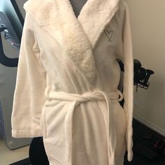 Bnwt - Victoria's Secret Angel Cozy Hooded Sherpa Spa Fleece Soft Plush Robe. Robe Has Never Been Worn. 100% Polyester. Silver Embroidered Vs Heart On Left Chest. Has Side Pockets. Last Picture Is From Another Lister To Show The Hood. Robe Is All White. White Winter Sleepwear, Winter White Sleepwear For Relaxation, White Winter Sleepwear For Relaxation, White Cozy Winter Sleepwear, Cozy White Winter Sleepwear, White Hooded Sleepwear For Lounging, White Winter Sleepwear For Overnight, Cozy White Hooded Sleepwear, Cream Winter Sleepwear For Lounging