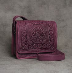 "Big leather purse, purple messenger bag, hot tooled purse, violet crossbody bag, purple shoulder bag, capacious leather bag, unique bag Model \"Lambs\" Impressive handmade bag made of premium 4 mm genuine calf leather, using rare technology of hot tooling. Executed in ethnic style, using geometric patterns. Great gift for true connosseuers of quality, handwork and distinctive style. Has one big compartment, one internal zip-pocket and one button pocket, e.g. for cell phone or keys. Dimensions: Purple Leather Rectangular Bag, Purple Leather Tote Shoulder Bag, Purple Leather Shoulder Bag With Adjustable Strap, Handmade Purple Satchel Shoulder Bag, Purple Leather Satchel With Removable Pouch, Purple Leather Satchel Bags, Handmade Purple Shoulder Bag, Purple Satchel Shoulder Bag Gift, Purple Shoulder Bag With Removable Pouch For Gift