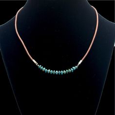 This unique American mined turquoise gemstone on natural brown leather necklace is quality crafted using: > Turquoise Gemstones > 24k Gold Plated Metal Seed Bead Spacers > 18k Gold Plated Jump Rings, Connectors & Cord Ends > 18k Lobster Claw Clasp with Extension Chain > 2mm Genuine Brown Leather Cord A great addition to any necklace collection! Turquoise Gemstones: Shape:  Rondelle Size:  4-5mm Adjustable:  16" to 18"  Be sure to check out the matching earrings in my shop! ALL orders are process Adjustable Beaded Necklaces With Waxed Cord, Adjustable Brown Necklace With Waxed Cord, Adjustable Waxed Cord Beaded Necklaces, Adjustable Waxed Cord Beaded Necklace, Adjustable Brown Waxed Cord Necklace, Beaded Necklace With Adjustable Waxed Cord, Handmade Turquoise Jewelry With Waxed Cord, Artisan Necklace With Adjustable Waxed Cord, Adjustable Artisan Turquoise Necklace