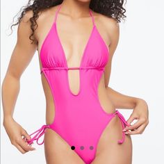 New Pink Plunging Halter One-Piece Swimsuit - Shell: 80% Nylon, 20% Spandex - Lining: 92% Polyester, 8% Spandex Spring Party Bodysuit With Triangle Top, Trendy Backless Swimwear For Spring, Trendy Fitted Swimwear With Cutout Details, Trendy Pink V-neck Swimwear, Trendy Fitted Cutout Swimwear, Chic Fitted Swimwear By Forever 21, Spring Swimwear From Forever 21, Spring Beach Bodysuit By Forever 21, Forever 21 Spring Beach Bodysuit