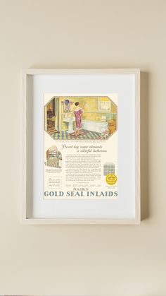 an old advertisement for gold seal inlaids hangs on the wall next to a shelf