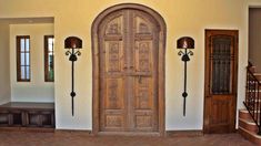 an ornate wooden door in the entry way